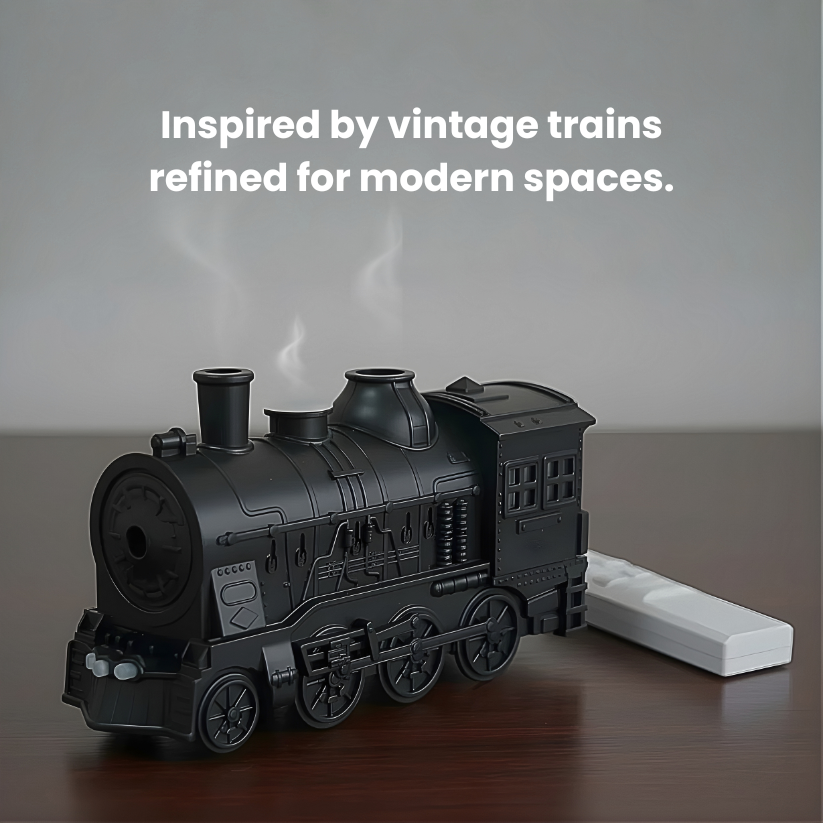 Black train-shaped diffuser on a wooden surface with a gray background and text 'Inspired by vintage trains refined for modern spaces'.