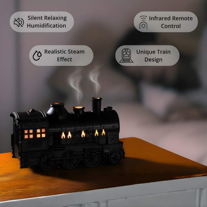 Black train-shaped humidifier on a wooden surface with features highlighted.